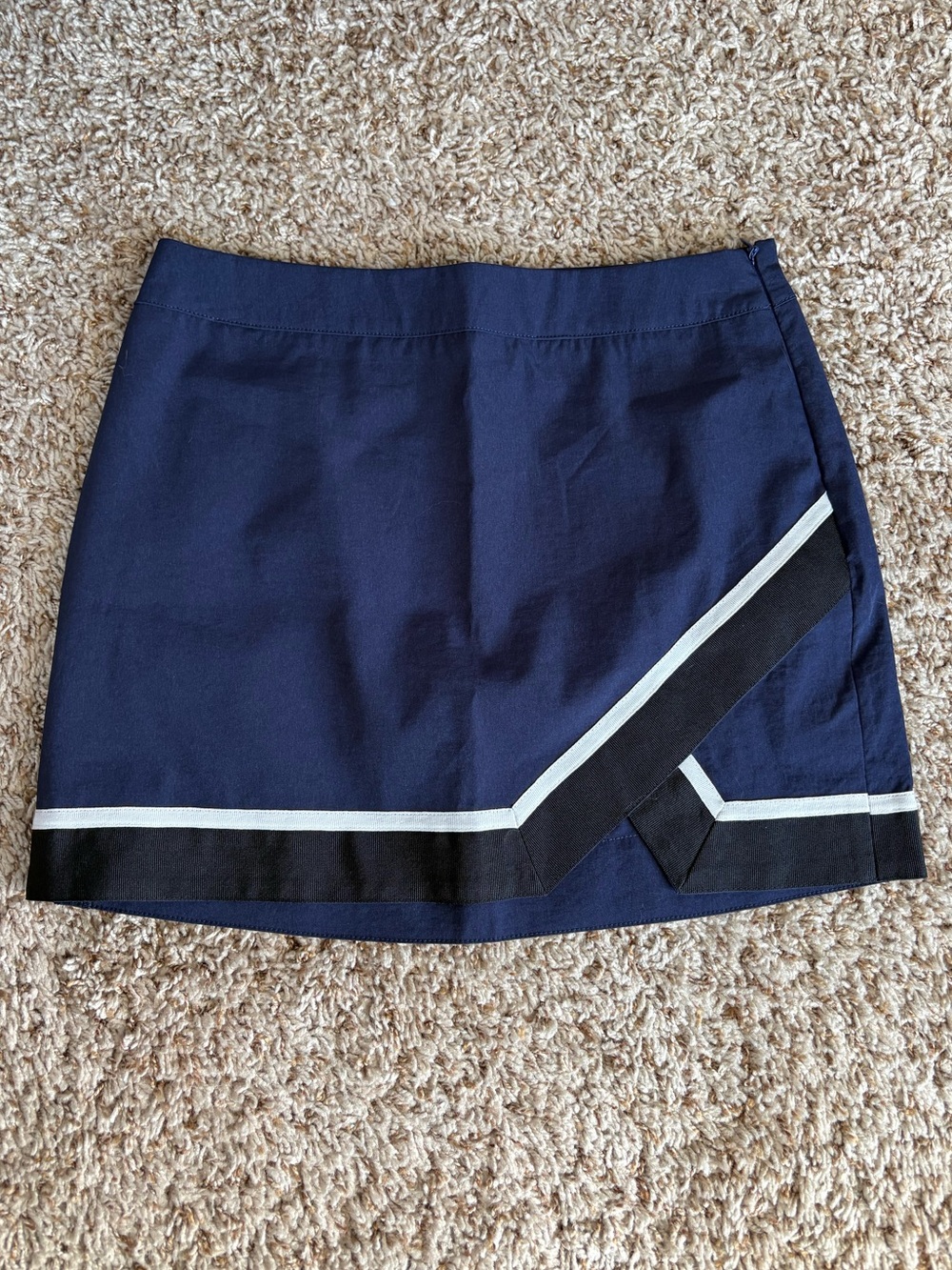 POSTER GIRL Navy Skirt with Black Label Detail